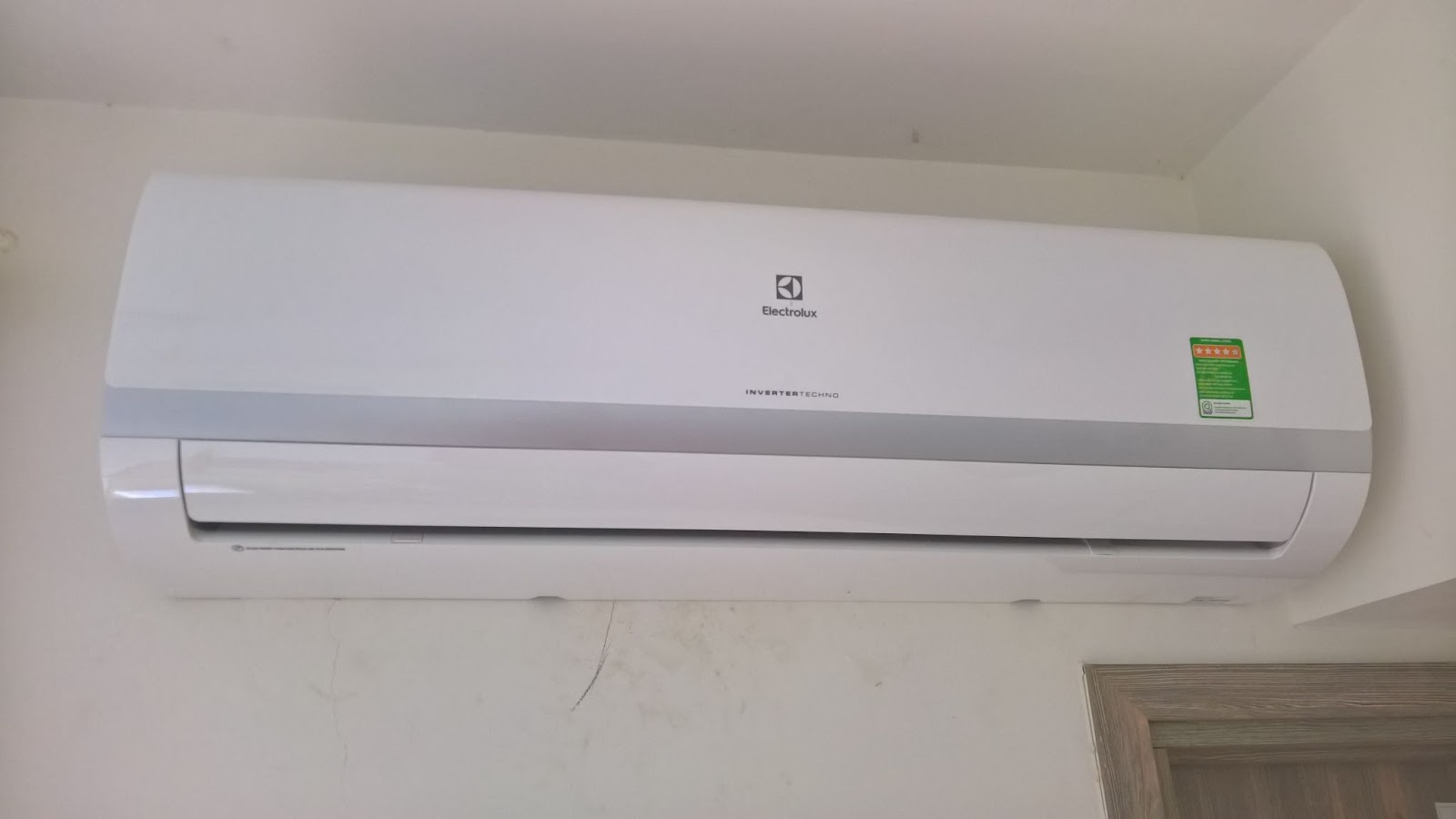 A reverse cycle air conditioner providing efficient heating and cooling.